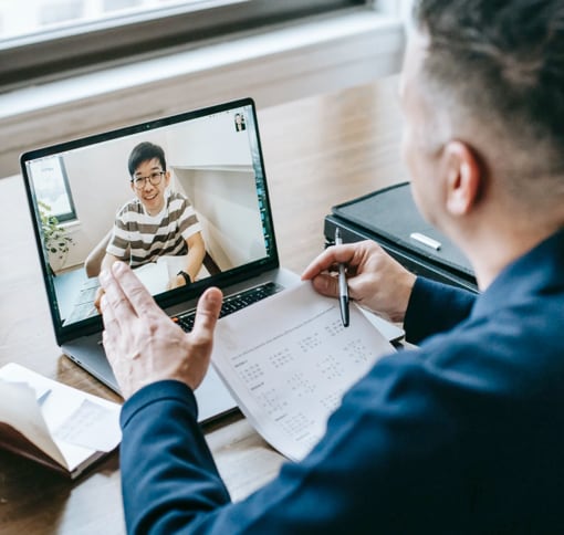 Picture of a man in an online meeting.